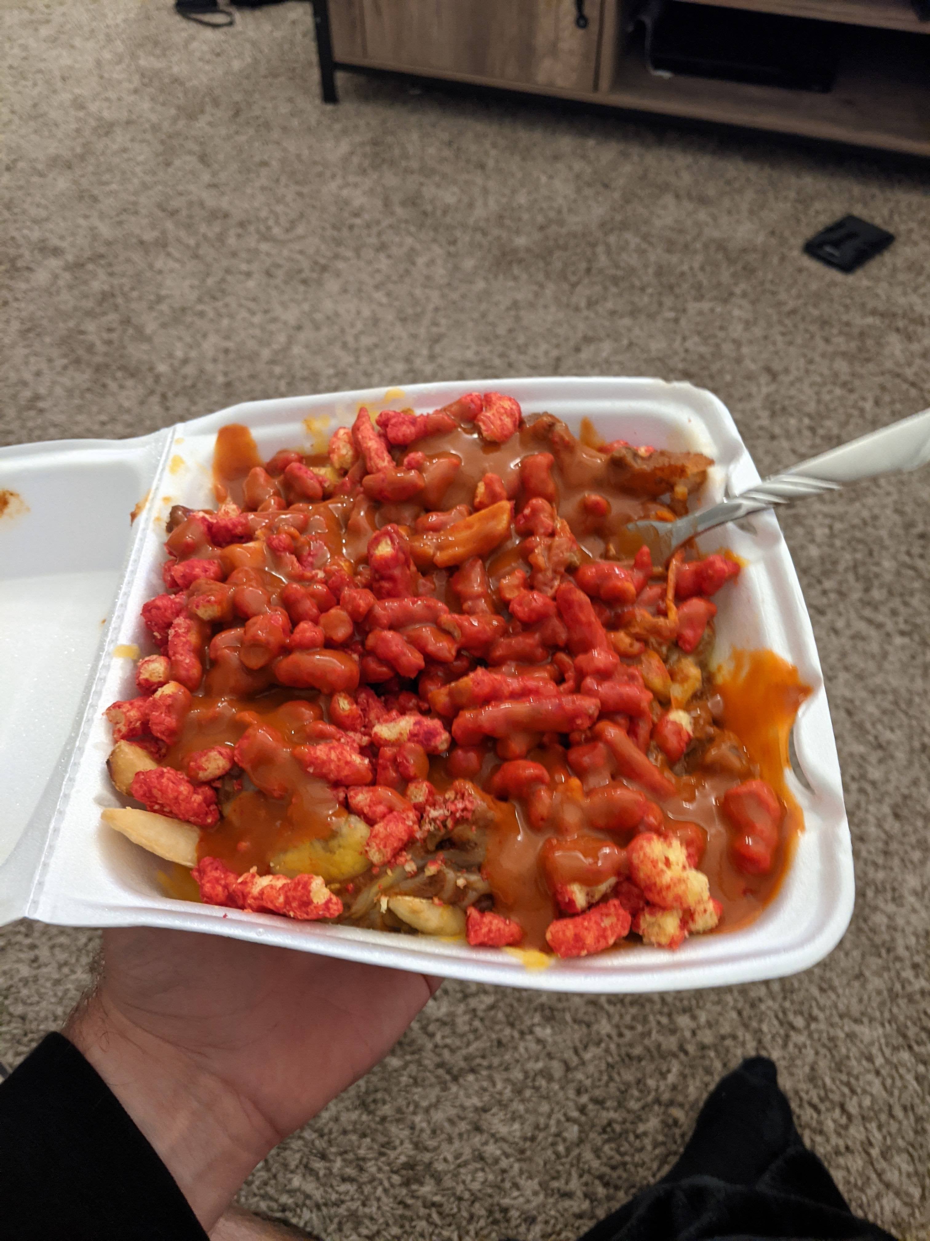 Chili Cheese Fries With Extra Hot Cheetos Topped With Black Label Valentinas Hot Sauce Chili